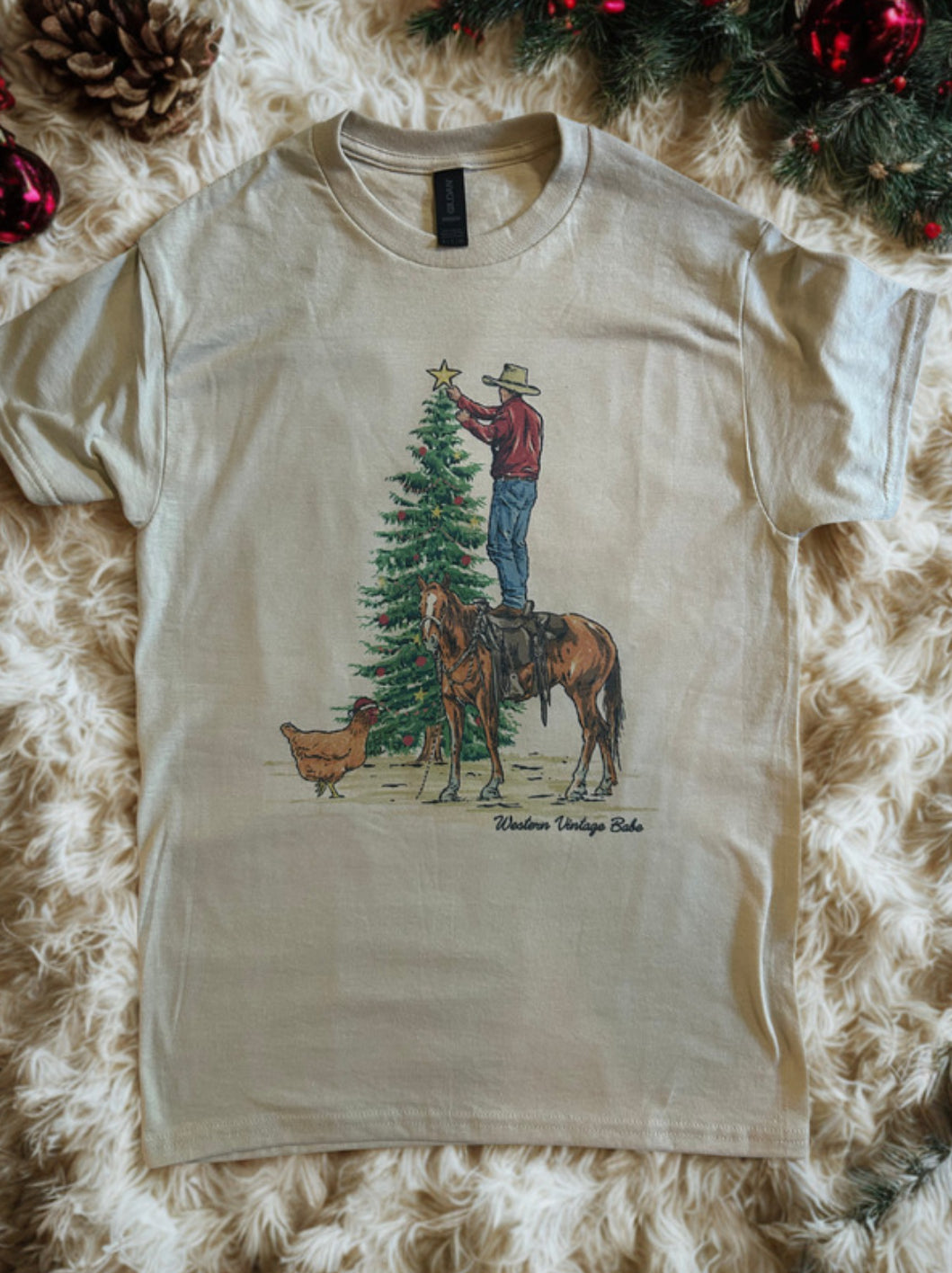 COWBOY DECORATING THE TREE